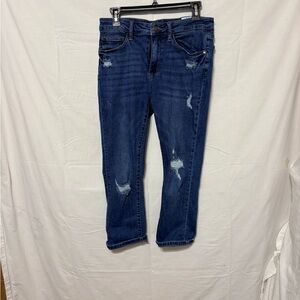 Judy Blue distressed capri-fit blue jeans.